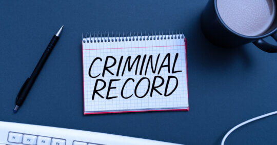 A Criminal record graphic that represents the question, "Does a Misdemeanor stay on your record?"