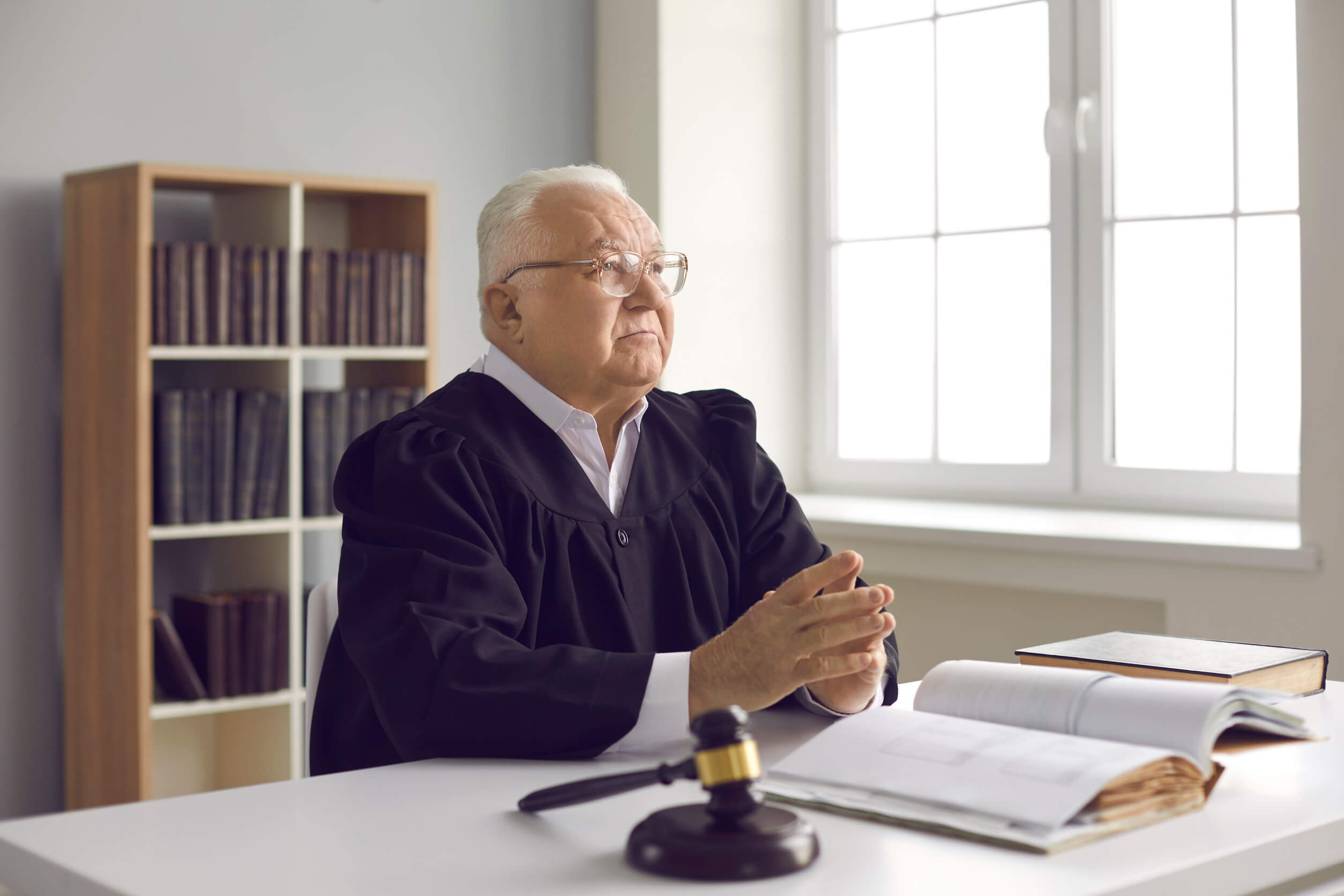 A judge getting ready to explain the difference between a bench warrant and a regular warrant.