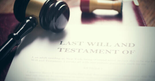 Last will and testament on a desk.